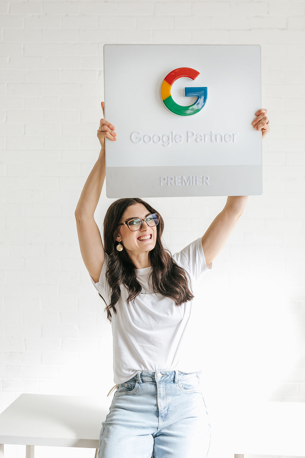 Kaity Griffin Google Ads expert sitting on floor smiling